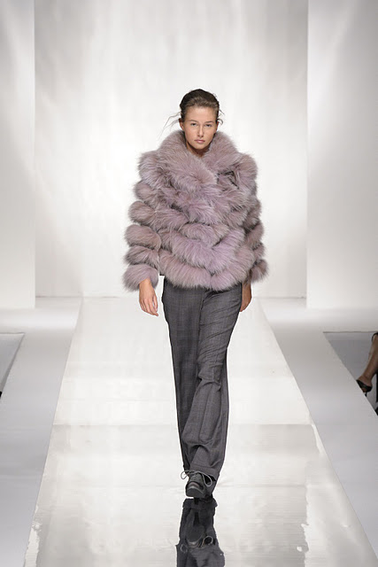 Model wearing fur coat at Carlo Ramello Fashion Show