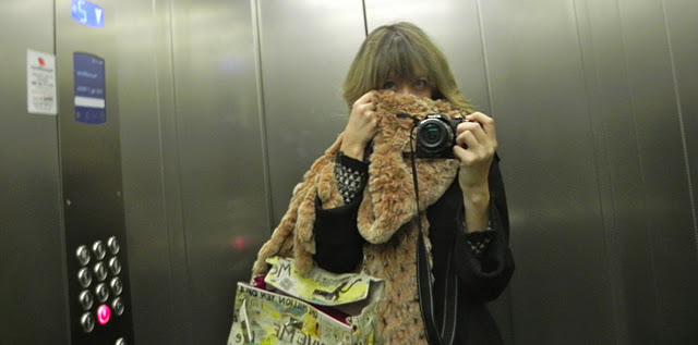 lady fur pic inside lift