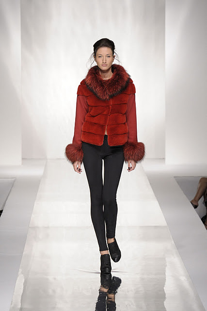 woman with carlo ramello red fur coat